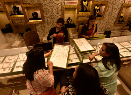 NEW DELHI INDIA APRIL 22 2023 People shop for gold on the occasion of Akshaya Tritiya at PP jewelers Karol Bagh on April 22 2023 in New Delhi India Akshaya Tritiya also known as Akti or Akha Teej is a popular Hindu and Jain spring festival that occurs annのeditorial素材