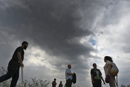 NEW DELHI INDIA APRIL 23 2023 Dark clouds hover over the City on April 23 2023 in New Delhi India The rain and cool winds are the result of a western disturbance that has been affecting northwest India Another western disturbance is set to hit the westernのeditorial素材
