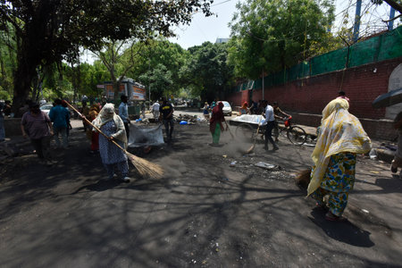 NEW DELHI INDIA APRIL 25 2023 Charred remains of a shop are seen after a massive fire broke out that gutted shops and roadside stalls at the mini market area of Sarojini Nagar on April 25 2023 in New Delhi India Five fire tenders were rushed to the spot aのeditorial素材