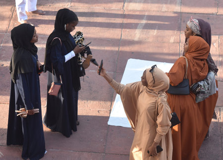NEW DELHI INDIA APRIL 22 2023 Muslims greets after offer prayers at the Jama Masjid on the occasion of Eid ul Fitr in Old Delhi on April 22 2023 in New Delhi India Muslims around the world are getting into the festive Eid spirit as the holy month of Ramadのeditorial素材