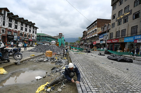 SRINAGAR INDIA APRIL 27 2023 Labourers carry renovation works in the City Centre Lal Chowk on April 27 2023 in Srinagar India Ahead of G20 meeting scheduled next month the Srinagar city is getting renovated under the Srinagar Smart City SSC project and maのeditorial素材