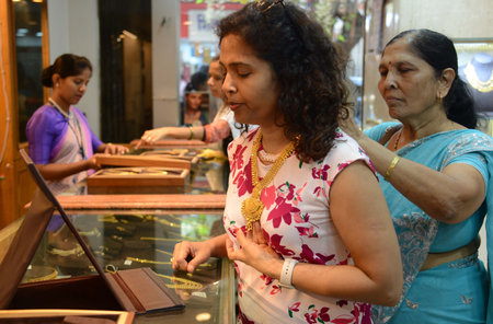 MUMBAI INDIA APRIL 22 2023 People purchasing gold ornaments on the occasion of Akshaya Tritiya Jewellery Shop at Dadar on April 22 2023 in Mumbai India Akshaya Tritiya also known as Akti or Akha Teej is a popular Hindu and Jain spring festival that occursのeditorial素材