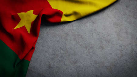 Flag of Cameroon on concrete backdrop. Cameroonian flag background with copy spaceの写真素材