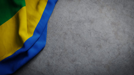 Flag of Gabon on concrete backdrop. Gabon flag background with copy space