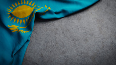 Flag of Kazakhstan on concrete backdrop. Kazakhstan flag background with copy space