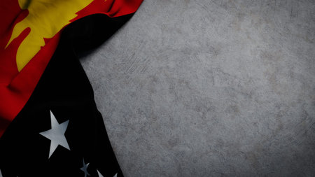 Flag of Papua New Guinea on concrete backdrop. Papua New Guinea flag background with copy space