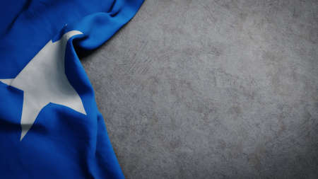 Flag of Somalia on concrete backdrop. Somali flag background with copy spaceの写真素材