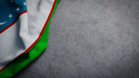 Flag of Uzbekistan on concrete backdrop. Uzbekistan flag background with copy spaceの写真素材