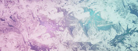 Artistic marbled acrylic pour in metallic pink and turquoise coloursの写真素材
