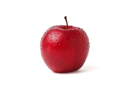 Red wet apple with water drops on white backgroundの写真素材