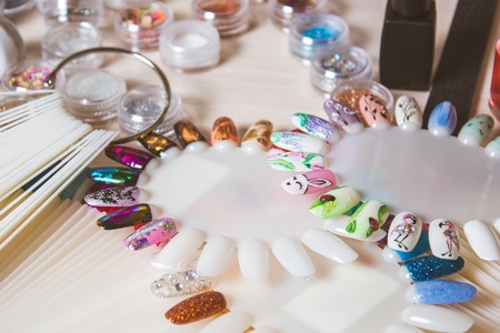 manicure set and nail polish for hands treatment on wooden backgroundの写真素材