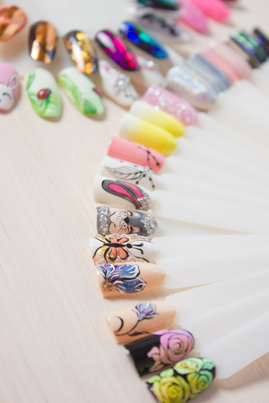 Manicure color picker. Nail samples, big collection of finger nails in various colorの写真素材