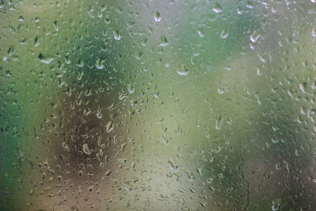 abstract water drops on glassの写真素材