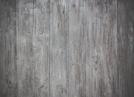 White wood texture background of distressed pine wood with knots. Natural white wooden texture wallpaper. Grayscale abstract background. Gray image of burnt wood. White wooden table top view.の写真素材