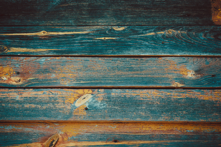 The brown and blue old wooden texture background with knotの写真素材