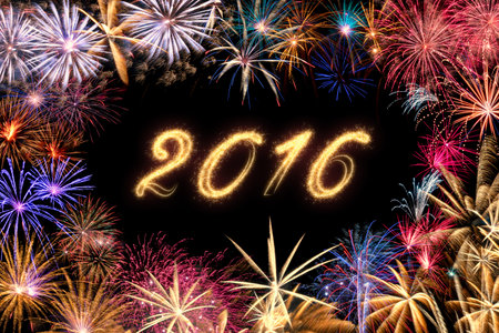 A colorful fireworks border  on a black background with sparkling text 2016.