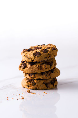 Chocolate chip cookies on white marble background