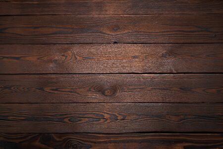 Rustic Planks of dark old wood texture backgroundの写真素材