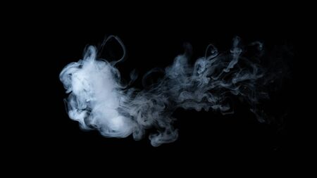 White smoke isolated on black backgroundの写真素材