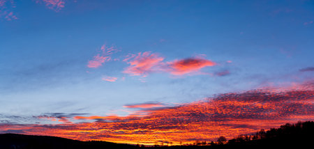Panoramic sunset sky and cloud backgroundの写真素材