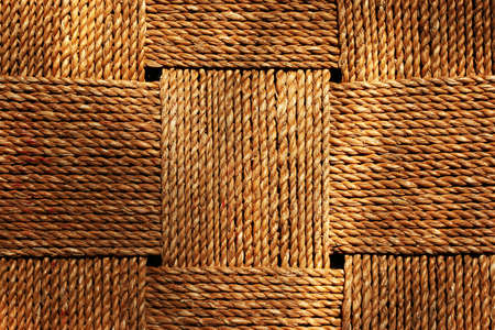 Square wickerwork pattern made of natural materialの写真素材