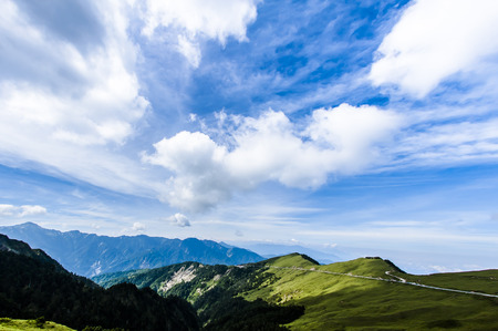 Scenic of Mountain on heaven above the ground. Good background for you to put text or people on the ground.の写真素材
