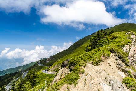 Scenic of Mountain on heaven above the ground. Good background for you to put text or people on the ground.の写真素材