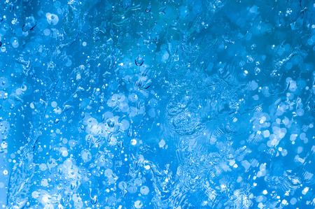 Drops water on the clear glass backgroundの写真素材