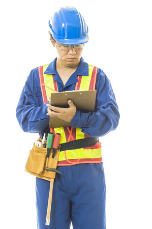 Portrait of a smiling worker. Isolated on whiteの写真素材
