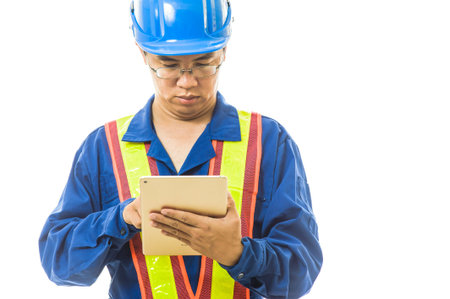 Portrait of a smiling worker. Isolated on whiteの写真素材