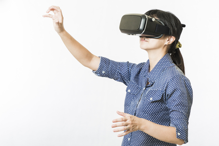 woman using the virtual reality headsetの写真素材