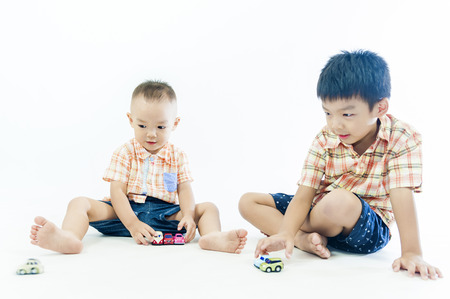 two children boys play togetherの写真素材