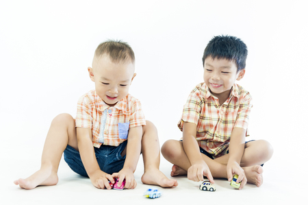 two children boys play togetherの写真素材
