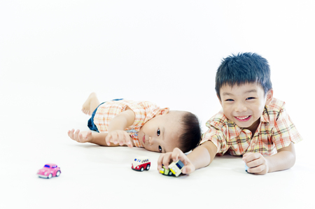 two children boys play togetherの写真素材