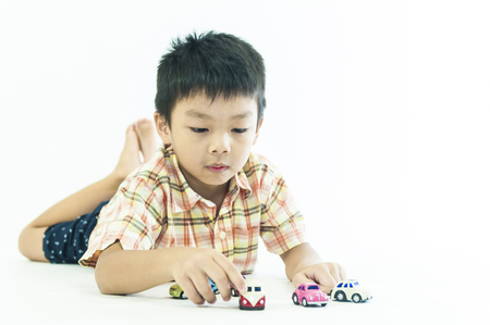 One children boys play toy carsの写真素材