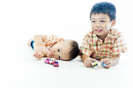 two children boys play togetherの写真素材