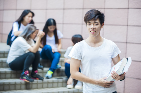group of happy college students outdoorsの写真素材