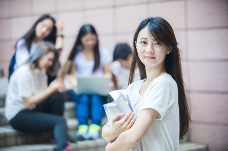 group of happy college students outdoorsの写真素材