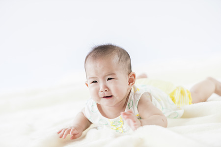 bright portrait of adorable babyの写真素材