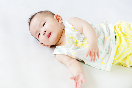 bright portrait of adorable babyの写真素材