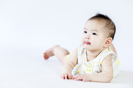 bright portrait of adorable babyの写真素材