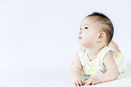 bright portrait of adorable babyの写真素材