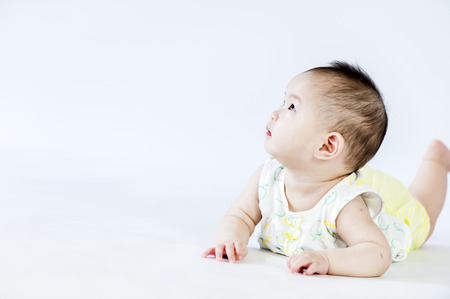 bright portrait of adorable babyの写真素材