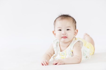 bright portrait of adorable babyの写真素材