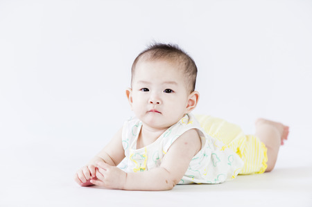 bright portrait of adorable babyの写真素材