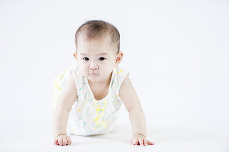 bright portrait of adorable babyの写真素材