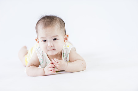 bright portrait of adorable babyの写真素材