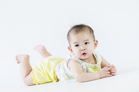 bright portrait of adorable babyの写真素材