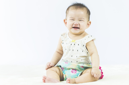 bright portrait of adorable babyの写真素材
