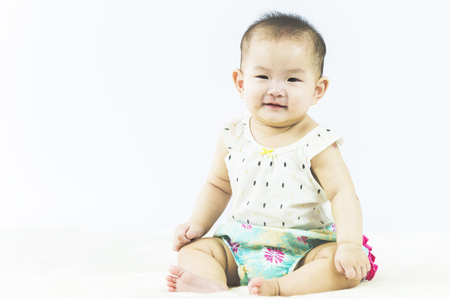 bright portrait of adorable babyの写真素材